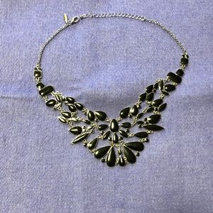 Pretty silver colored with black stones necklace